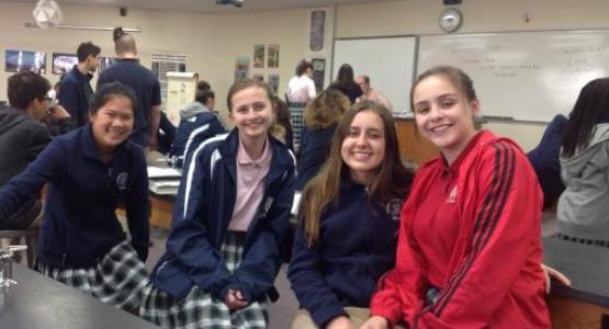 Class of 2021 students Heidi Davis, Allison Erdelyi, Annicka Hoffman and Hope Griseto take a break during Physics class.