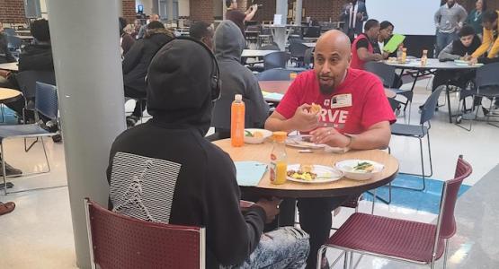 Community Praise Church member Gerald Kelly shares words of wisdom with a mentee. Community Praise Empowers Black Male Mentorship, Alexandria City Public Schools, Melvyn Warfield, Servolution Ministry, Siobhan Gordon-Mould,