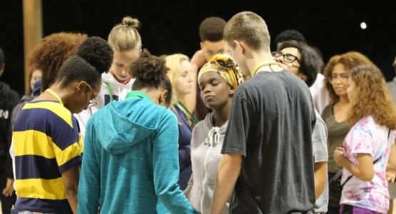 During opening night of SALT, students pray for each other’s fears during an icebreaker activity.