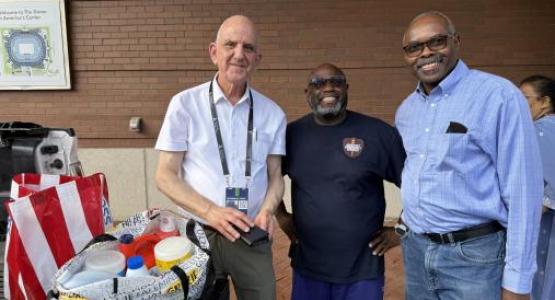 Sligo church member Anees Abdelnour (left) and Agape church members Lionel Bailey and Jornas Pierre lend a helping hand to refugee families in St. Louis. Sligo church member Anees Abdelnour (left) and Agape church members Lionel Bailey and Jornas Pierre lend a helping hand to refugee families in St. Louis.