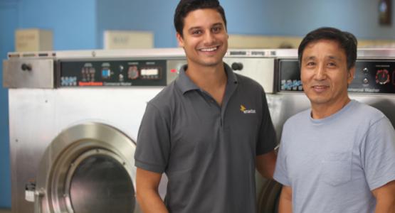 Ross Patterson photographed Enactus member Levi Soares and owner Nok Kim in the Rainbow Coin Laundry in Silver Spring, Md., Ross Patterson photographed Enactus member Levi Soares and owner Nok Kim in the Rainbow Coin Laundry in Silver Spring, Md.,