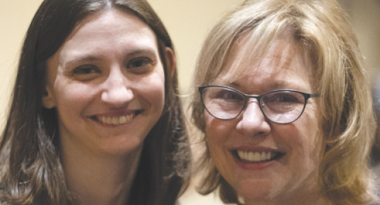 Jane Lanning (right), retired music and drama teacher, stands by her former student and colleague, Lisa Froelich, who planned the surprise event. Jane Lanning (right), retired music and drama teacher, stands by her former student and colleague, Lisa Froelich, who planned the surprise event.