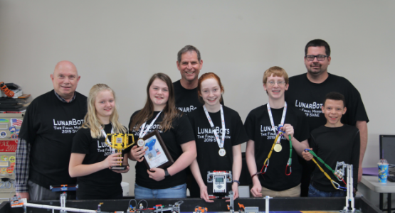 SVAE’s robotics team places first in three categories at the national robotics competition in Florida. (Left to right) Coach Bill Dodge, Emma Davis, Olivia Patrick, Coach Gordon Miller, Lora Moulder, Michael White, Coach Mike Moulder and Dakota  Gullatte. 