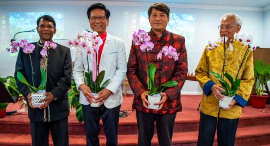 Current and former pastors Ebenezer Samuel, Joseph Jiao, Akira Chang and Oliver Koh receive orchids as a small token of appreciation for their dedicated service and commitment to the church.