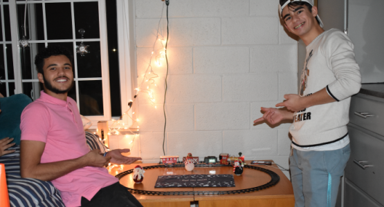 Hartle Hall residents Kevin Oliveira and Gabriel Moraes hang out together in the dorm. Hartle Hall residents Kevin Oliveira and Gabriel Moraes hang out together in the dorm.