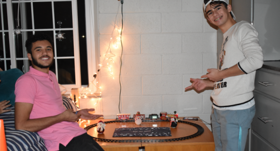 Hartle Hall residents Kevin Oliveira and Gabriel Moraes hang out together in the dorm.