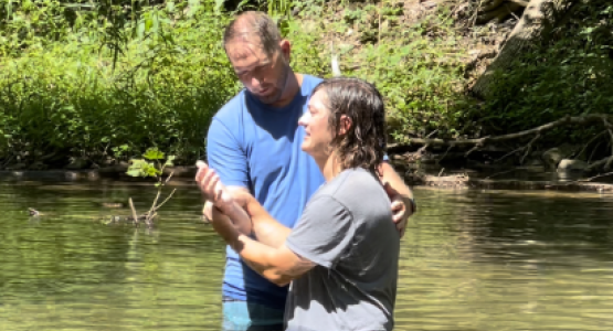 Matthew Haire, pastor of the Morgantown (W.Va.) church, baptizes Alan Ayala at the New Believer’s retreat. Matthew Haire, pastor of the Morgantown (W.Va.) church, baptizes Alan Ayala at the New Believer’s retreat.