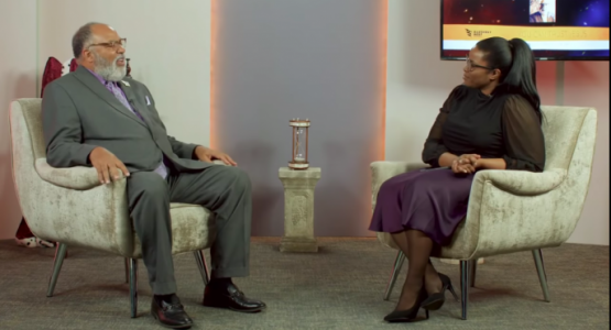 Benia Jennings, Allegheny West Conference’s multimedia coordinator, sits with President William T. Cox Sr., to discuss his sermon on the book of Revelation.