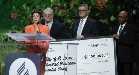 The Seventh-day Adventist Church presents the Cara Spencer, mayor of St. Louis, a check for $100,000. Photo by Seth Shaffer/AME (CC BY 4.0) The Seventh-day Adventist Church presents the Cara Spencer, mayor of St. Louis, a check for $100,000. Photo by Seth Shaffer/AME (CC BY 4.0)