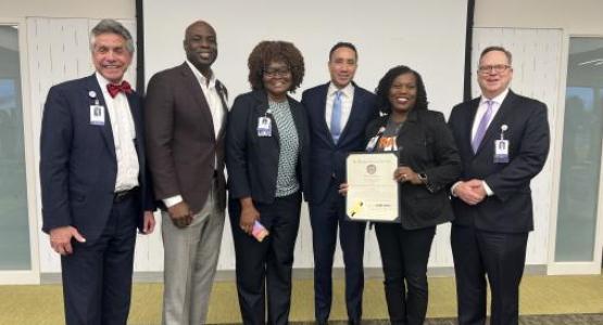 Senator Will Smith (D-20) presented a proclamation to White Oak Medical Center for receiving the highest national safety grade. (From left to right) John Sackett, EVP & Chief Operating Officer, Adventist HealthCare; Kevin Cargill, Vice President & Chief Financial Officer, White Oak Medical Center; Mabel Ankrah, Vice President & Chief Nursing Officer, White Oak Medical Center; Senator Will Smith (D-20, Maryland); Felicia Benjamin, Director of Quality Services, White Oak Medical Center; Robert Jepson, Chief O