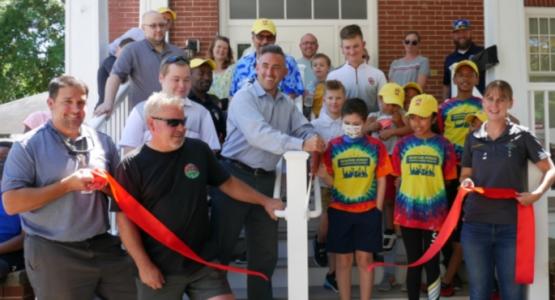 Salisbury Mayor Jacob Day (center) cuts the ribbon at the grand opening of the Newton Street Community Center. Chesapeake Conference, Beacon of Light church