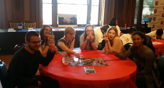 Shakespeare class members Mitchell Jackson, Quincy Collins, Emily Bennett, Sidney Collins, Zoe Jacobs and Cierra Stewart play the board game they created for PROJECT38, the Cincinnati Shakespeare Company’s educational program. 