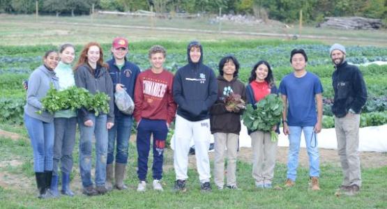 Philip Wigul (pictured below, far right), agriculture director at Potomac Conference’s Shenandoah Valley Academy (SVA), helps run Immanuel’s Ground, a garden and greenhouse that sells food to the community and supplies SVA students with fresh produce.