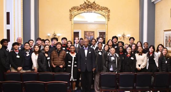 U.S. Senate Chaplain Barry Black (center) stands united with the Class of 2025, as he commends Adventist education. Government Class Inspired by Capitol Hill Field Trip, Shenandoah Valley Academy, Barry Black, Class of 2025, Samuel Mora, U.S. Capitol, Library of Congress, Ben Cline