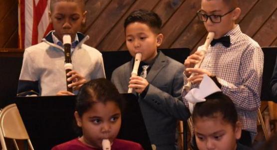 Lake Nelson Adventist Academy middle-schoolers whistle away on their recorders.  