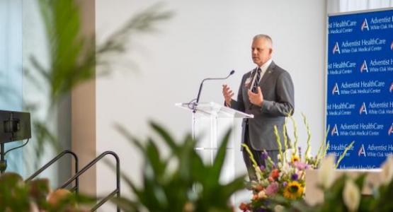 Erik Wangsness, president of WAH, speaks at the dedication of the new Adventist HealthCare White Oak Medical Center. Photo by Eli Turner 