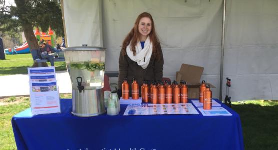 Bonnie Alexander, RD, a dietician and the outpatient diabetes educator at Washington Adventist Hospital, offered fruit-infused water and explained the benefits of drinking water instead of sugary beverages at Washington Adventist University’s Family Fun Festival on Sunday. Bonnie Alexander, RD, a dietician and the outpatient diabetes educator at Washington Adventist Hospital, offered fruit-infused water and explained the benefits of drinking water instead of sugary beverages at Washington Adventist University’s Family Fun Festival on Sunday.