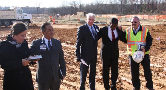 Anne Roda, vice president of Mission Integration & Spiritual Care, Adventist HealthCare; Chaplain Biaka Chhangte, Adventist HealthCare; Geoff Morgan, vice president of Expanded Access, Washington Adventist Hospital; Dwain Esmond; and Joe Kranz, project executive for Turner Construction, at ceremony marking the start of foundation work on the new WAH campus in White Oak, Maryland. Photo: Adventist HealthCare