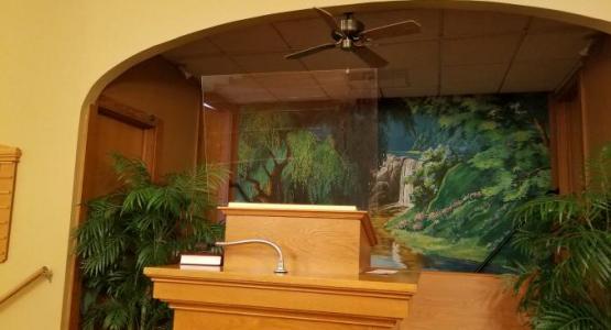 Joshua Bandel, a member at Pennsylvania Conference's Washington church, installed the plexiglass shield on the pulpit.