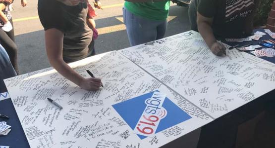WGTS listeners sign a card for capitol police