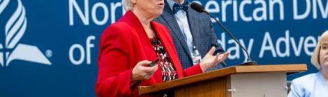 Andrea Luxton and Ken Shaw, executive director and president of AACU, respectively, share a report during NAD's year-end meeting. Photo by NAD Staff.