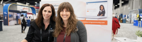 Paola Franco-Oudri, associate director of Adventist Learning Center and Heather More, project manager for Adventist Learning Community, greet people at the NAD portion of GC Session exhibit hall. Photo by Katie Fellows / Lake Union Herald