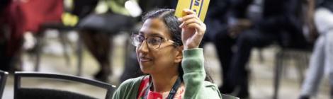 Leena Moses, a young adult delegate from the Potomac Conference, participates in the voting process during the General Conference Session. Photo by Nathaniel Reid/AME (CC BY 4.0)