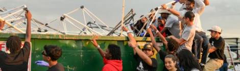 Chesapeake Conference's New Hope Nighthawks "dumpster toss" following the thunderstorm.