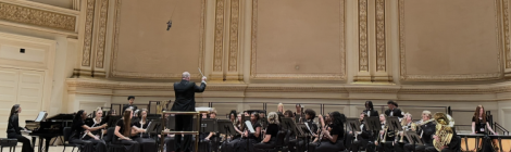 The high school band practices on stage at Carnegie Hall prior to their concert performance.