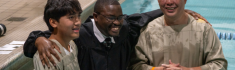 Elvis Mogoi (center), pastor of the Baltimore-White Marsh church, baptizes Renzo (left) and Ricky Pajaron. Elvis Mogoi (center), pastor of the Baltimore-White Marsh church, baptizes Renzo (left) and Ricky Pajaron.
