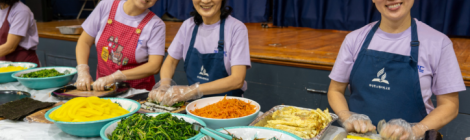 Washington-Spencerville Korean church members Seon Young Park, Gwi Young Jeong and Sarah Kim (left) serve food during the community expo, while My Life Foundation representatives (above) staff their health booth.