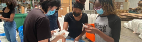 Clifton members Houpu Xu, Lawrencia Robinson and Farrah Mugwisi sort medical supplies for shipment to overseas disaster zones at the Matthew 25 Ministries community center.