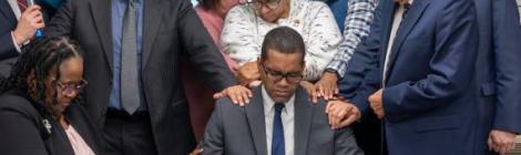The Chesapeake Conference Executive Committee prays for Andre Hastick following his election. Photo by Melvin Donadelle