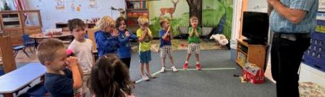 Steve Kimes prays before teaching music class at Parkersburg Academy.