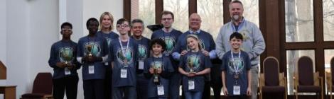 Geography Challenge winners proudly stand with Ohio Conference staff members.