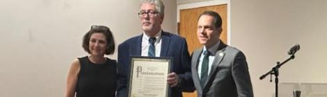 For more than 40 years of service, ACSGW and John Gavin (pictured, center), current ACSGW executive director, were honored with a Montgomery County Council Proclamation and a Certificate of Recognition by the City of Takoma Park.
