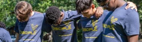 Lucas Chow (’27), William Miongo (’27), Andrew Pozo (’28) and Samuel Joel (’28) pause to pray during the academy’s spiritual retreat.