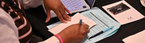 Attendees work through a sample accounting problem at the 2025 Fall Treasurer's Council Meeting