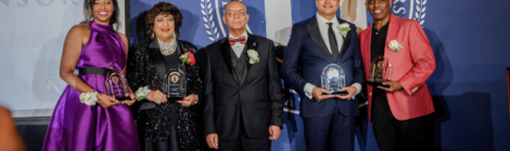 Dr. Weymouth Spence, WAU president, is flanked by the four honorees who were awarded for their service in action during the 12th Annual Visionaries Gala. 