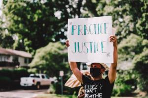 Pastor Munoz, associate pastor at Seabrook church, participates in a march for racial justice. Photo by Peter A. Roberts