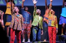 Youth from the Watoto Children Choir, a Christian ensemble from Uganda made up of orphans or kids living in difficult situations, sing songs of God’s love to members at the Columbus Central church.