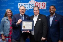 Mayor Bridget Newton (left), and councilmembers Sidney Katz and Will Jawando (right), declare August 23, 2019, "WGTS 91.9 Day," awarded to President and General Manager Kevin Krueger (second from right).