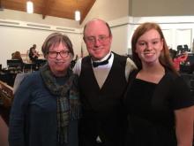 Mentor Susan Berry; RingFest founder and director William Ashley; and Alexandra Murphy, the 2019 recipi- ent of the Susan Berry Leadership in Handbells award, celebrate together.