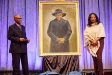 Artist, Simmie Knox, and Lisa Sweeney-Walker, great, great grandniece of Lucy Byard unveil the portrait.