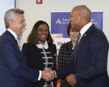 President & CEO John Sackett, SVP & System Chief Medical Officer Patsy McNeil, MD, and Fort Washington Medical Center President Eunmee Shim share a laugh with Maryland Governor Wes Moore during a tour of the hospital to discuss expanding access.
