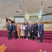  Ricky Martin, Bethel church senior pastor; Christ-Roi Cheres, head elder; Abdelle Cheres, member; Lisa Hood, elder of the Southeast church in Cleveland; Vivian Martin, member; Marvin C. Brown, III, Allegheny West Conference (AWC) president; Keisha Stubbs-Bone, AWC treasurer; and Joel Johnson, AWC executive vice president, cele- brate the church’s mortgage liquidation.