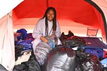 Prentice Park Pathfinder Braise Ellis packs up her tent.