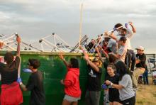 Chesapeake Conference's New Hope Nighthawks "dumpster toss" following the thunderstorm.