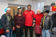 Fourth Street Friendship members with with Buffalo soldiers volunteers at an event for those experiencing homelessness