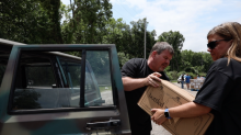 Grandview Hospital employees worked with employees from the Harrison Township Police office (pictured right) and members from an area church in Northridge to provide water to impacted area residents.